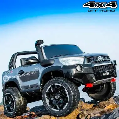 Детский электромобиль TOYOTA HILUX DK-HL850 4X4 (полноприводный 4WD, двухместный с резиновыми колесами и кожаным сиденьем)